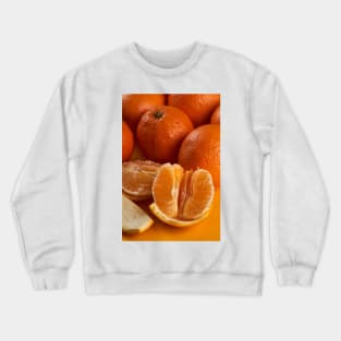 Oranges on a yellow background Crewneck Sweatshirt